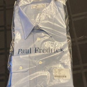 Long sleeve light blue dress shirt. 35 sleeve. All cotton